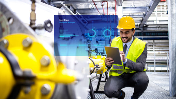 Worker looking at a tablet and analyzing data
